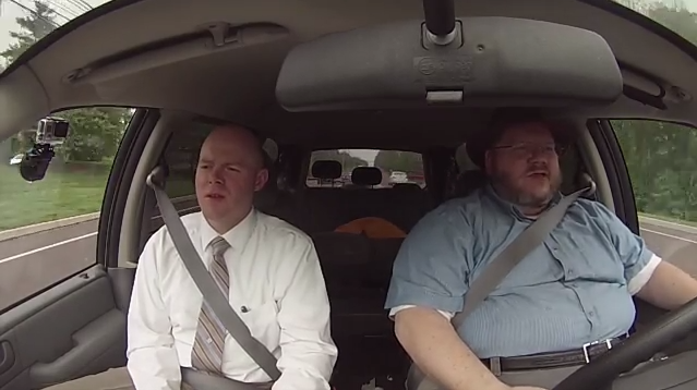 Theologians in a Car Speaking about a Conference